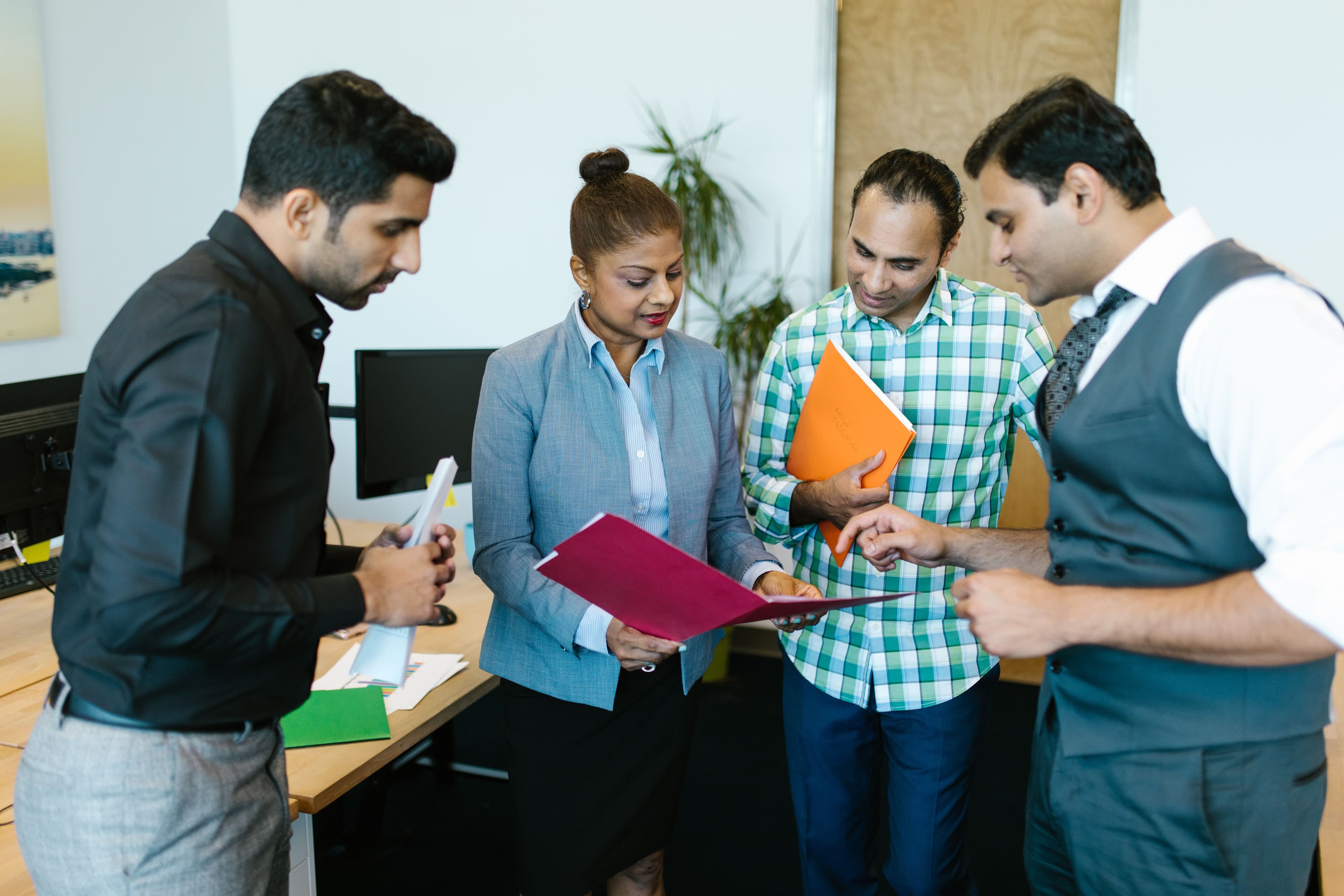 Business professionals collaborating in a modern office